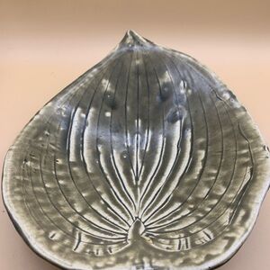 Sage Green Leaf-Shaped Ceramic Dish.  Has a makers mark.  Footed.  12”x9”